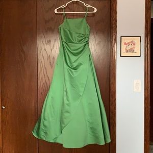 A green formal girls gown.